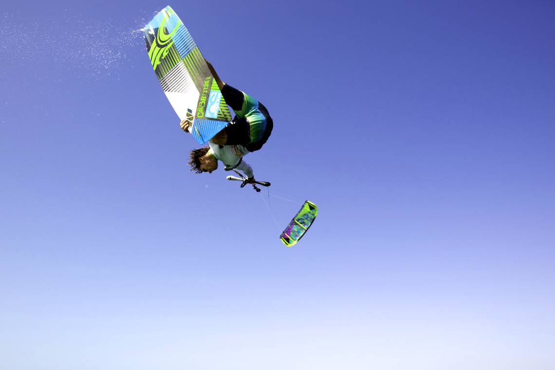 The Cabrinha Chaos kite in action - board grab kitesurfing