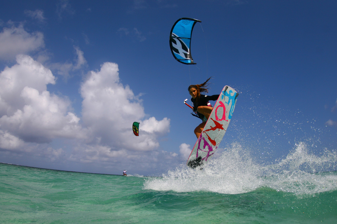 Celine Rodenas backroll with grab kitesurfing