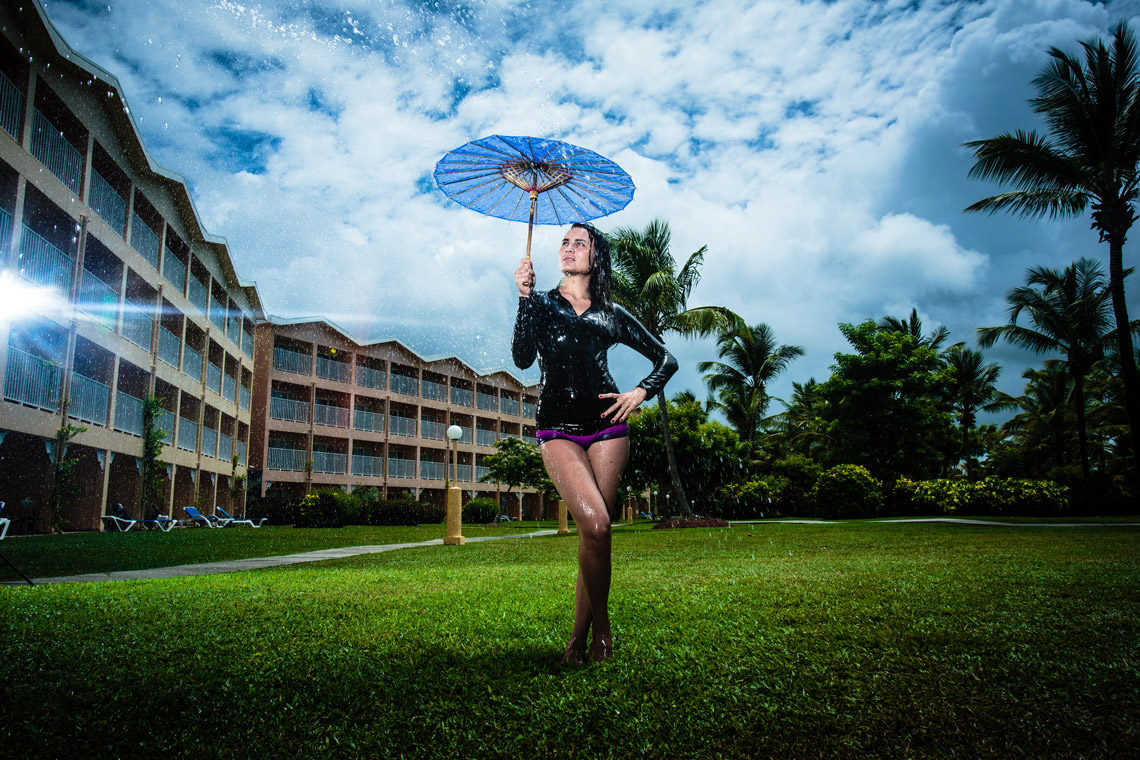 Bruna Kajiya taking shelter from all that rain