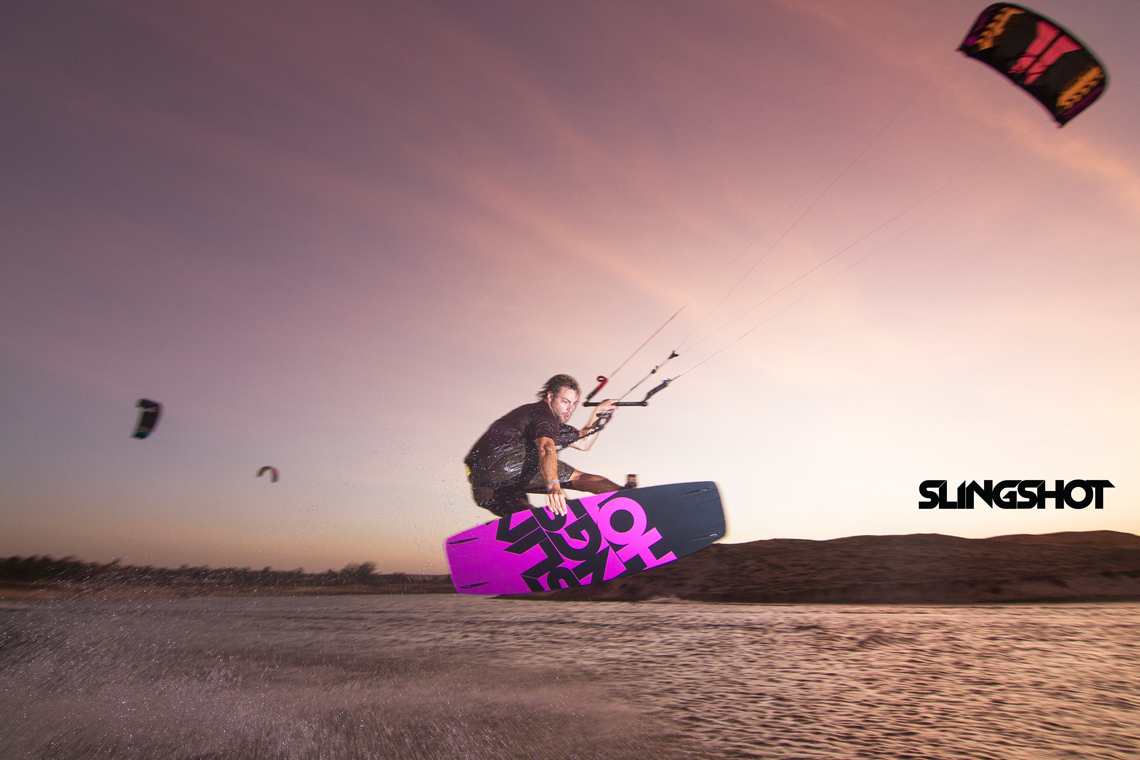 Grabbing some rail on the 2015 Slingshot Asylum board and flying the RPM kite.