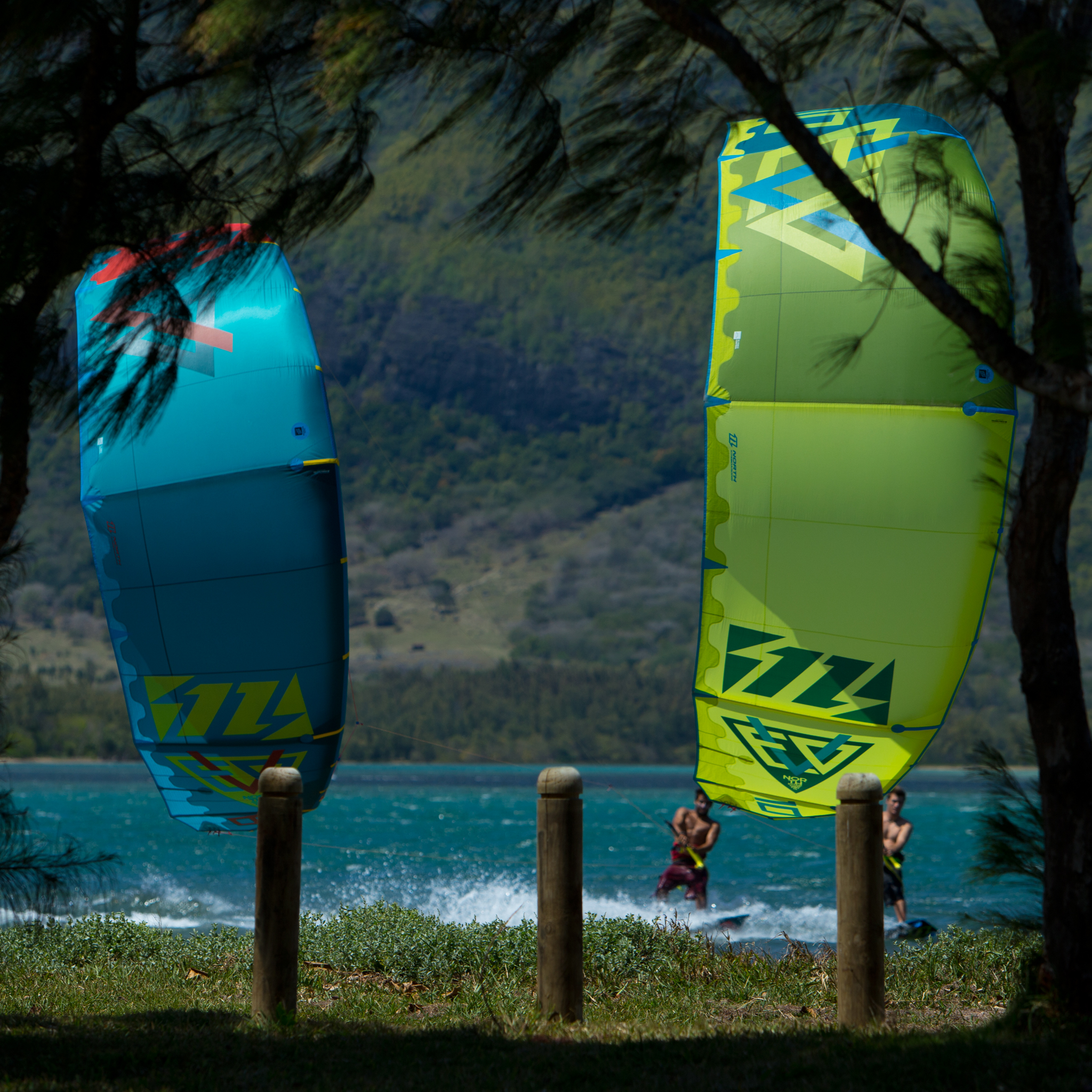 kitesurf wallpaper image - North Evo 2015 duo cruising between the trees - kitesurfing - in resolution: iPad 2 & 3 2048 X 2048