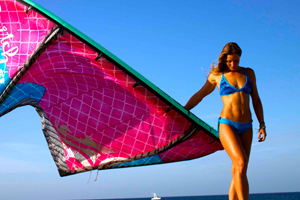 Melissa Gil with the Cabrinha Switchblade kite - in bikini on the beach