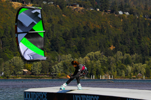 Sensi Graves kiteboarding on the slider with her Liquid Force kite