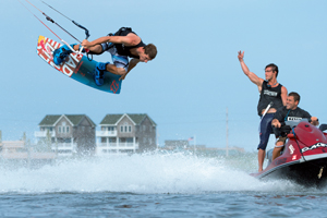 Aaron Hadlow on the 2015 North Team Series board saying hello to Jetski - North Kiteboarding