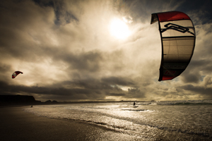 A nice sunset kitesurfing session in the waves.