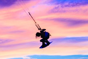 Indie grab at sunset with Tona Boards - kitesurfing